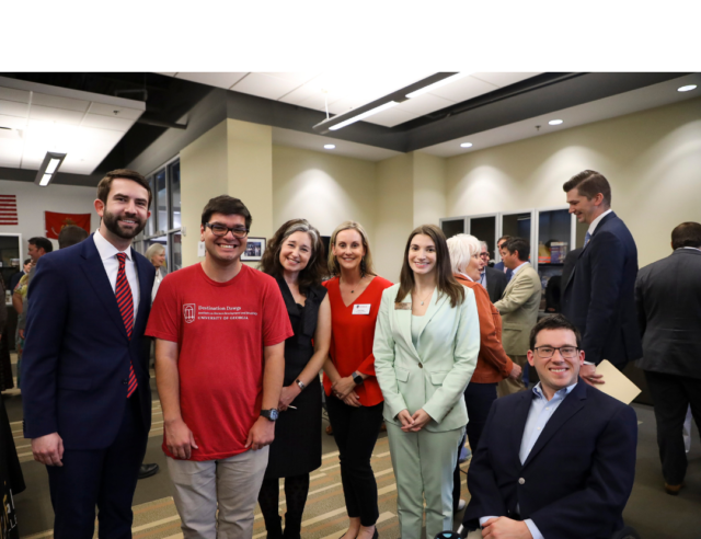 A picture of a group of people inside the Georgia State Capital. From left to right the people are Georgia State Representative Houston Gaines, Destination Dawg Ben Harrison, GCDD Executive Director D’Arcy Robb, Destination Dawg's Program Director Lisa Ulmer, Inclusive Post-Secondary Education and Employment Director Starr Bruner, and GCDD Legislative Advocacy Director Charlie Miller.